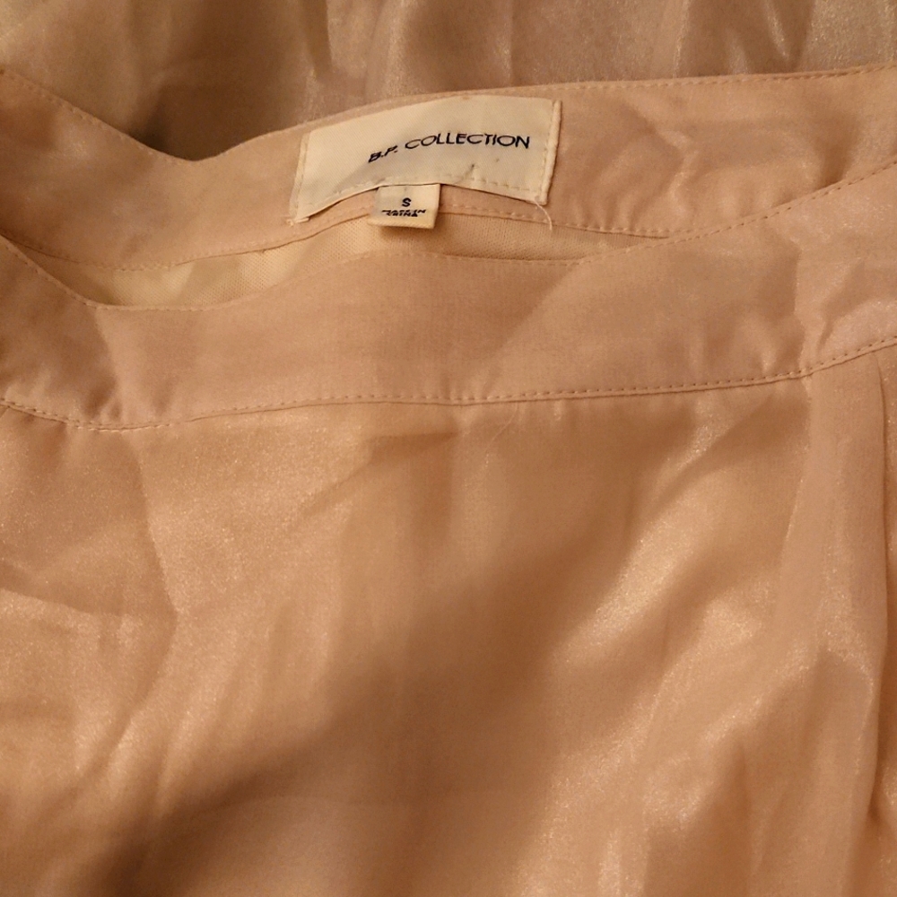 Long sheer skirt size S brand new no tag. Gold shimmer